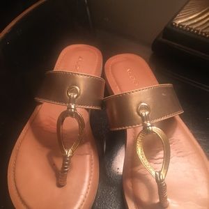 Pretty gold sandals.
